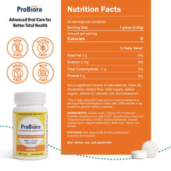 Close-up of an orange-flavored probiotic tablet