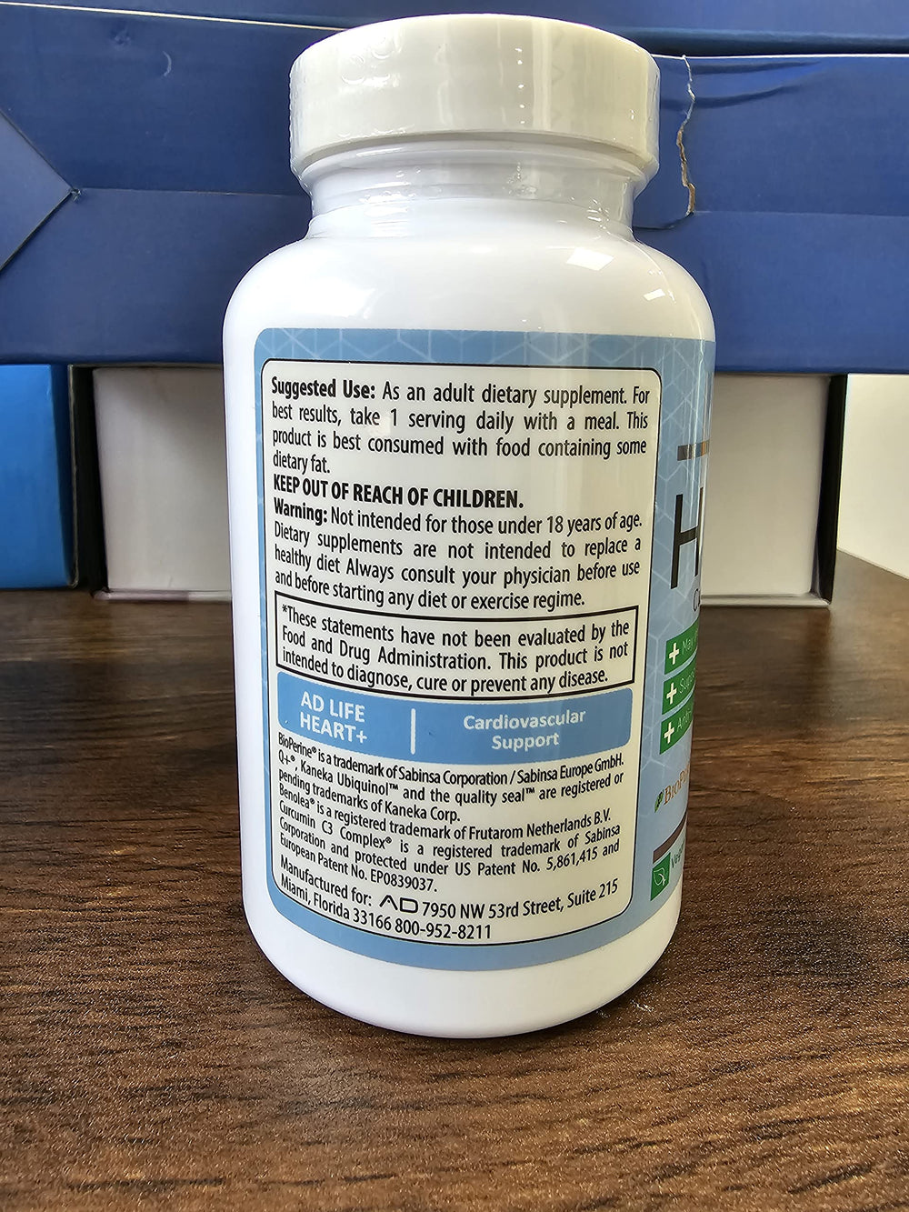 Close-up of Project AD Heart+ bottle label showing CoQ10 and Hawthorn