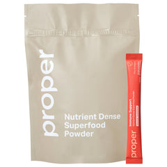 Proper Orange Immune Support powder – orange-tangerine flavor with scoop