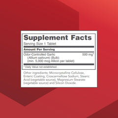 Close-up of enteric-coated garlic tablets labeled 5,000 mcg allicin