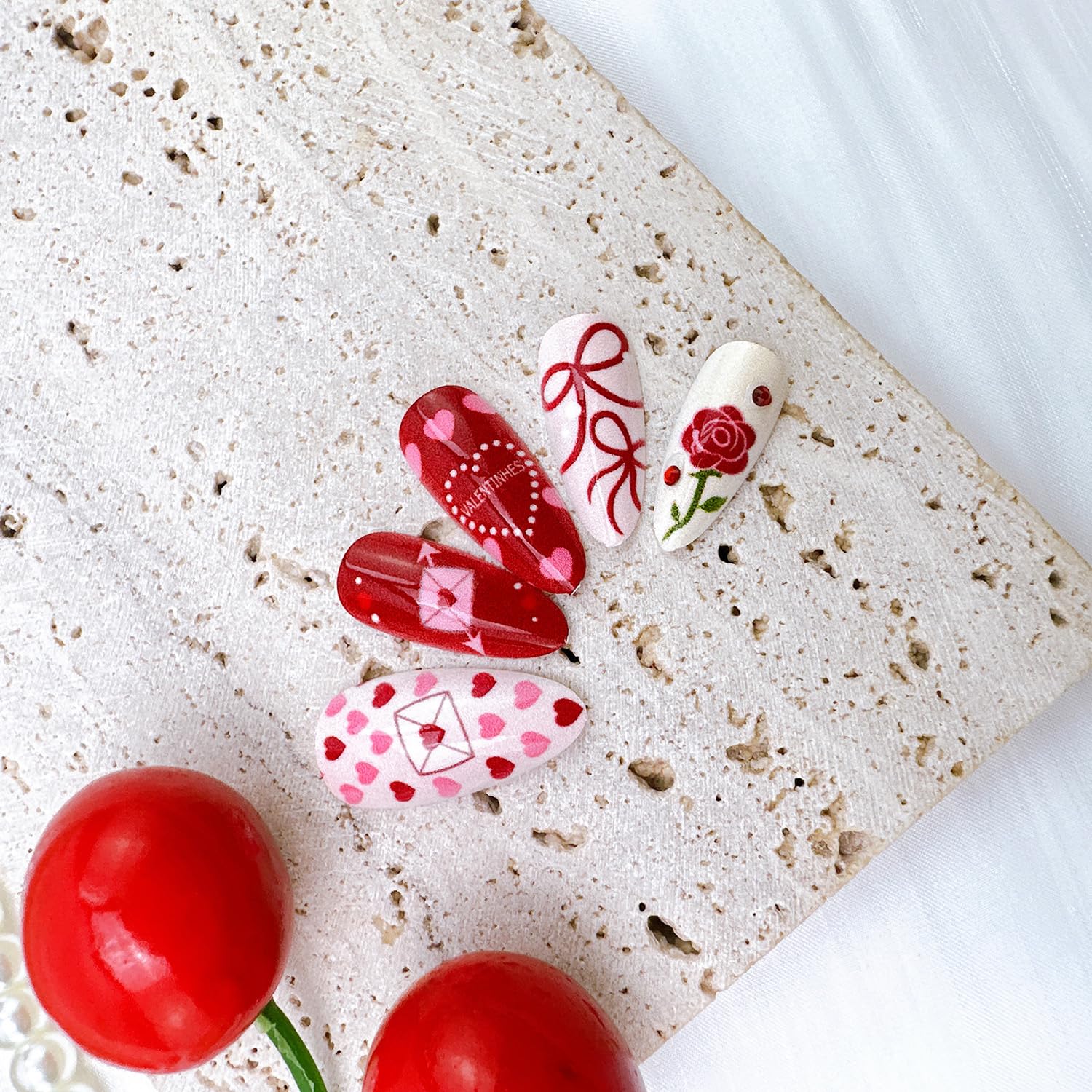 PSBRBAD nails with heart rhinestones add sparkle for celebrations and dates.