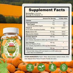 Gummies displayed on a white background with a glass of water