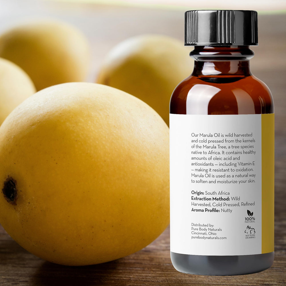 Pure Body Naturals Marula Oil label highlights wild-harvest origin.