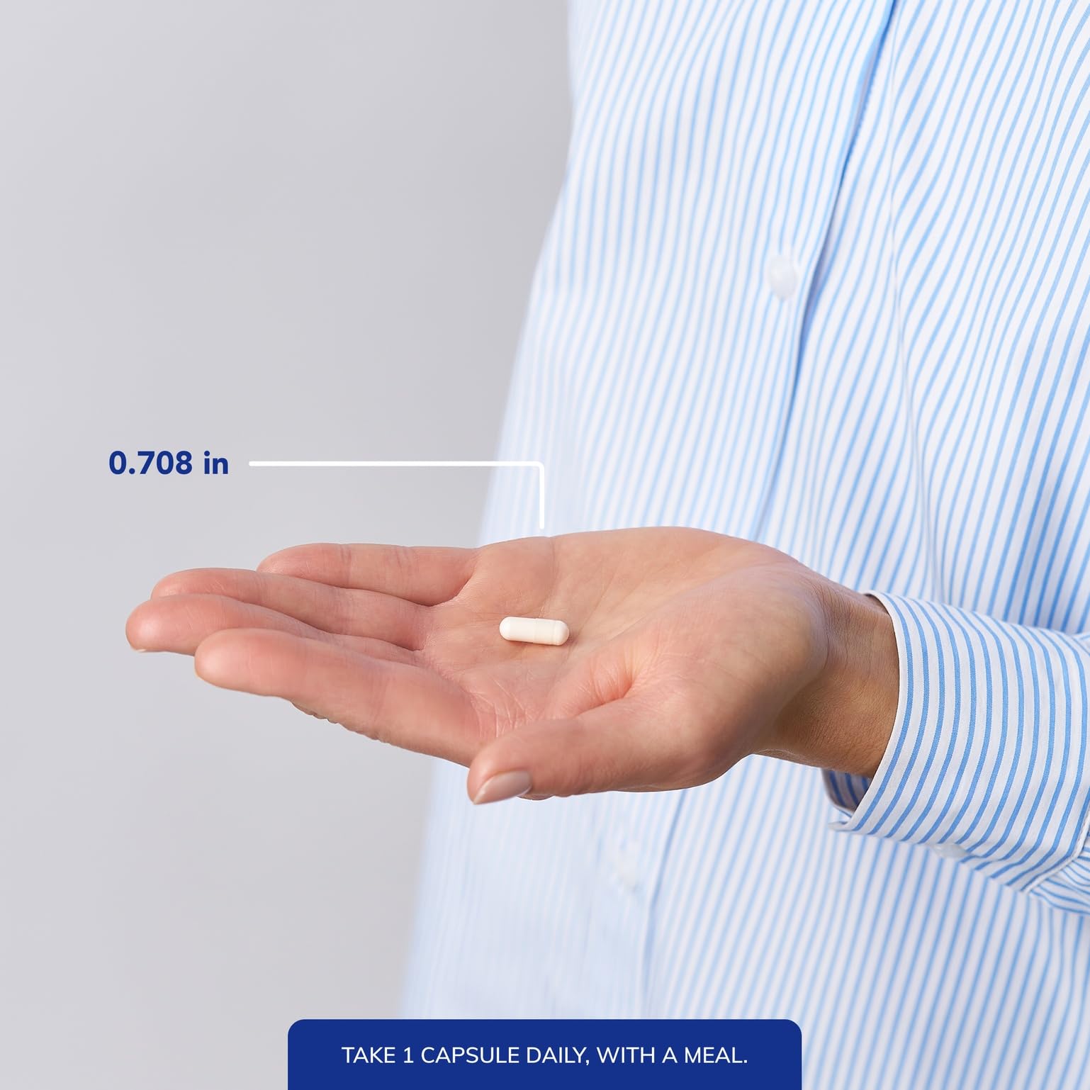 Pure Encapsulations Biotin Complex bottle pouring capsules into hand