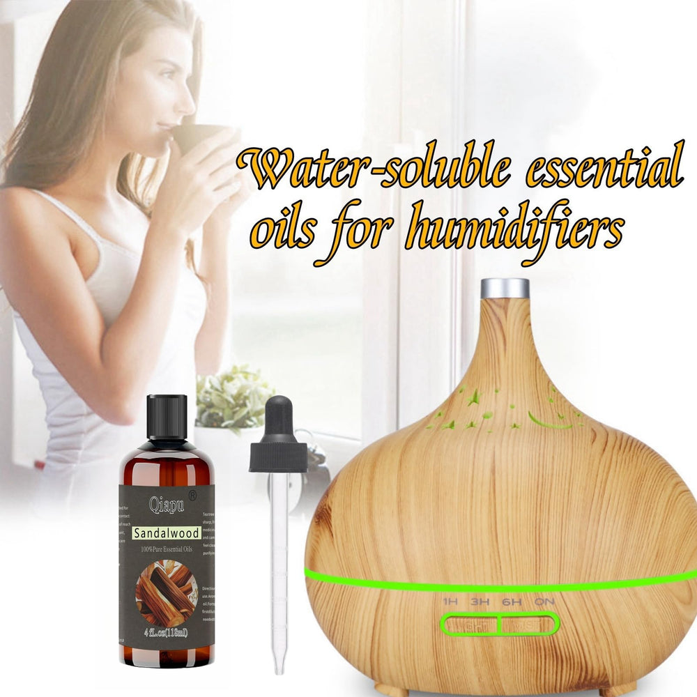 Sealed sandalwood essential oil dropper bottle on a wooden background