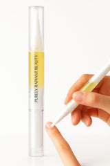 Purely Radiant Nail Growth Oil bottle close-up showing nourished cuticles and healthy nails