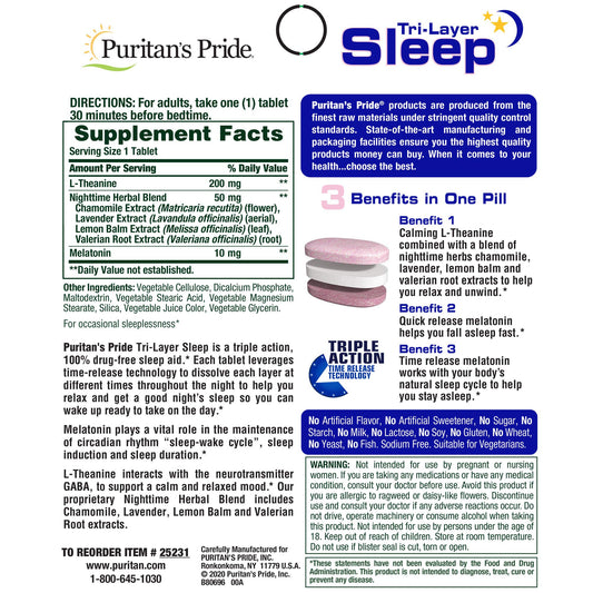 Close-up of tri-layered sleep tablets from Puritan's Pride