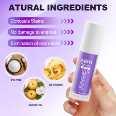 Toothbrush applying purple toothpaste for whitening