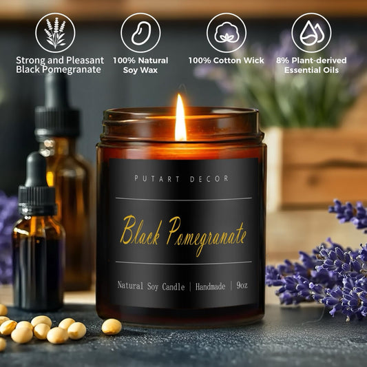 Close-up of Putart Black Pomegranate Soy Candle 9oz in amber jar