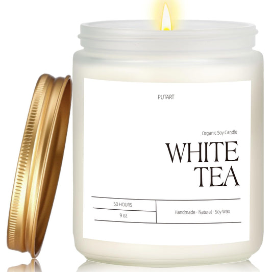 Front view of Putart White Tea candle 9oz in frosted white jar