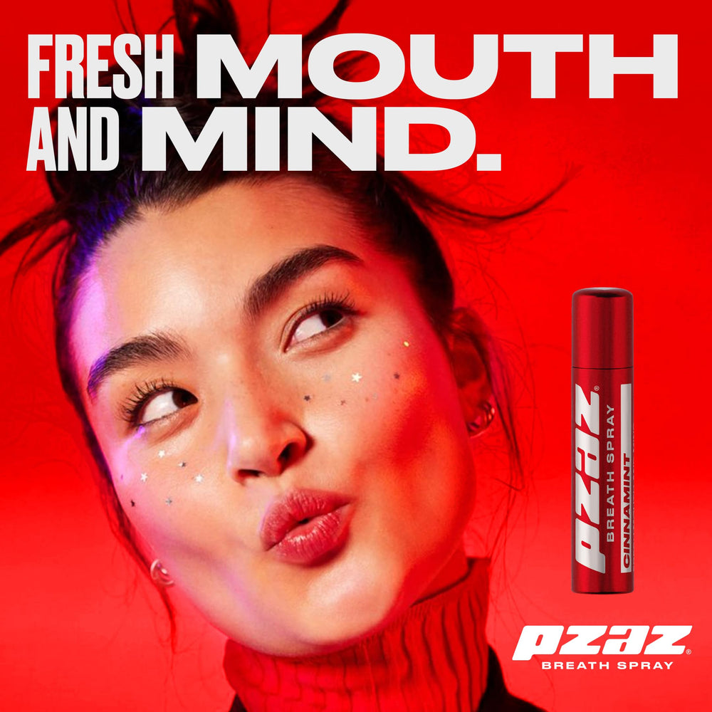 Pzaz Breath Spray held in hand for portability