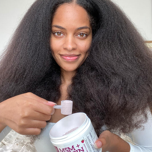 Back view of the 8.5 oz MSM + Biotin Hair Nutrient Blend bottle