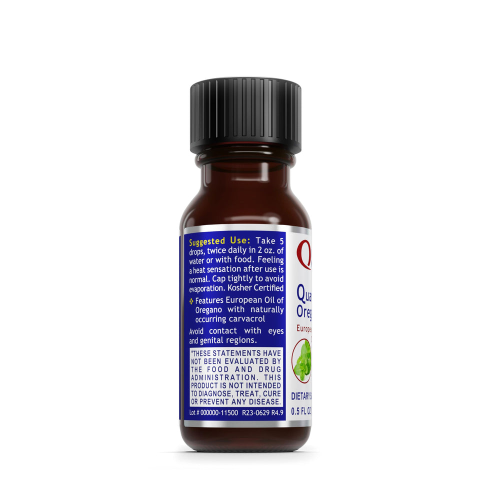 Organic oregano leaves and oil bottle