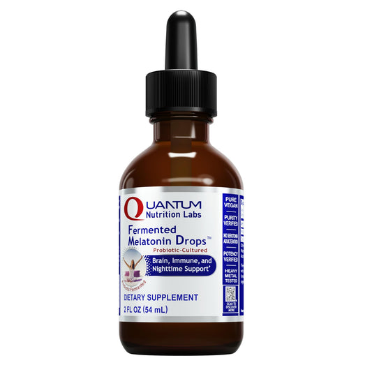 Bottle of Quantum Nutrition Labs Fermented Melatonin Drops in amber glass