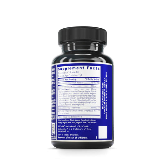 Close-up of Quantum Relax and Slumber capsules inside bottle