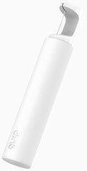 Mint floss refill spool expanding to clean between teeth – close-up
