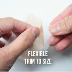 Quitch silicone scar sheets trimmed for adjustable size during recovery.
