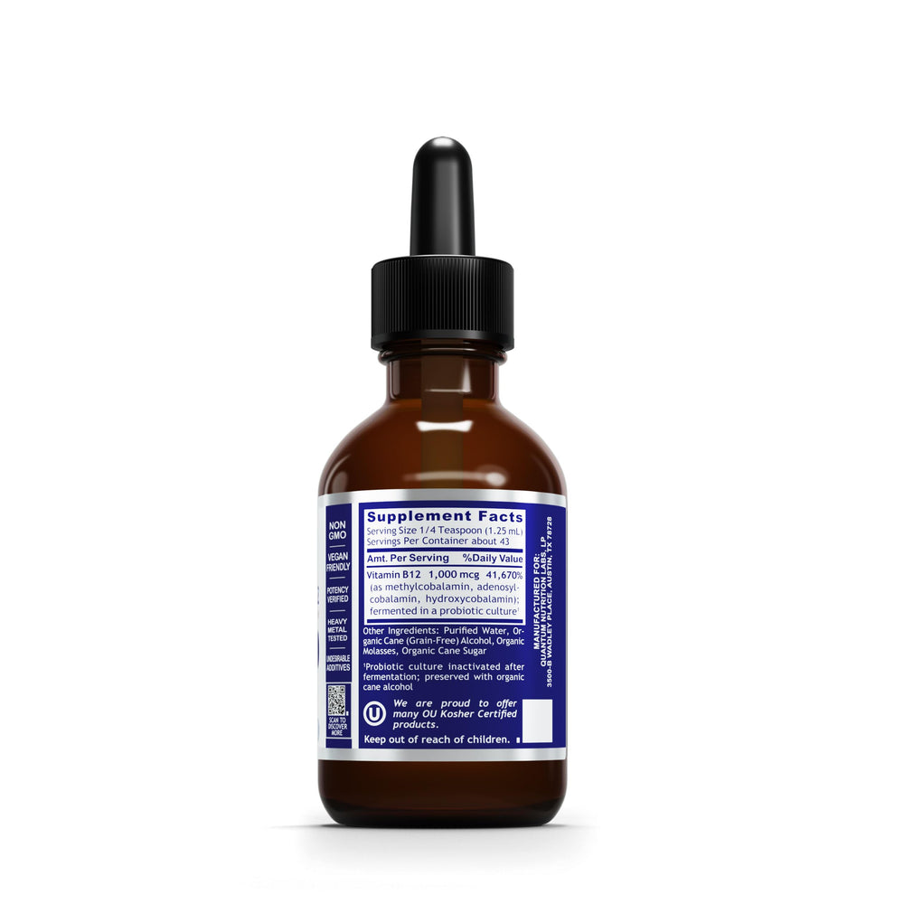 Close-up of liquid B12 drops from the dropper