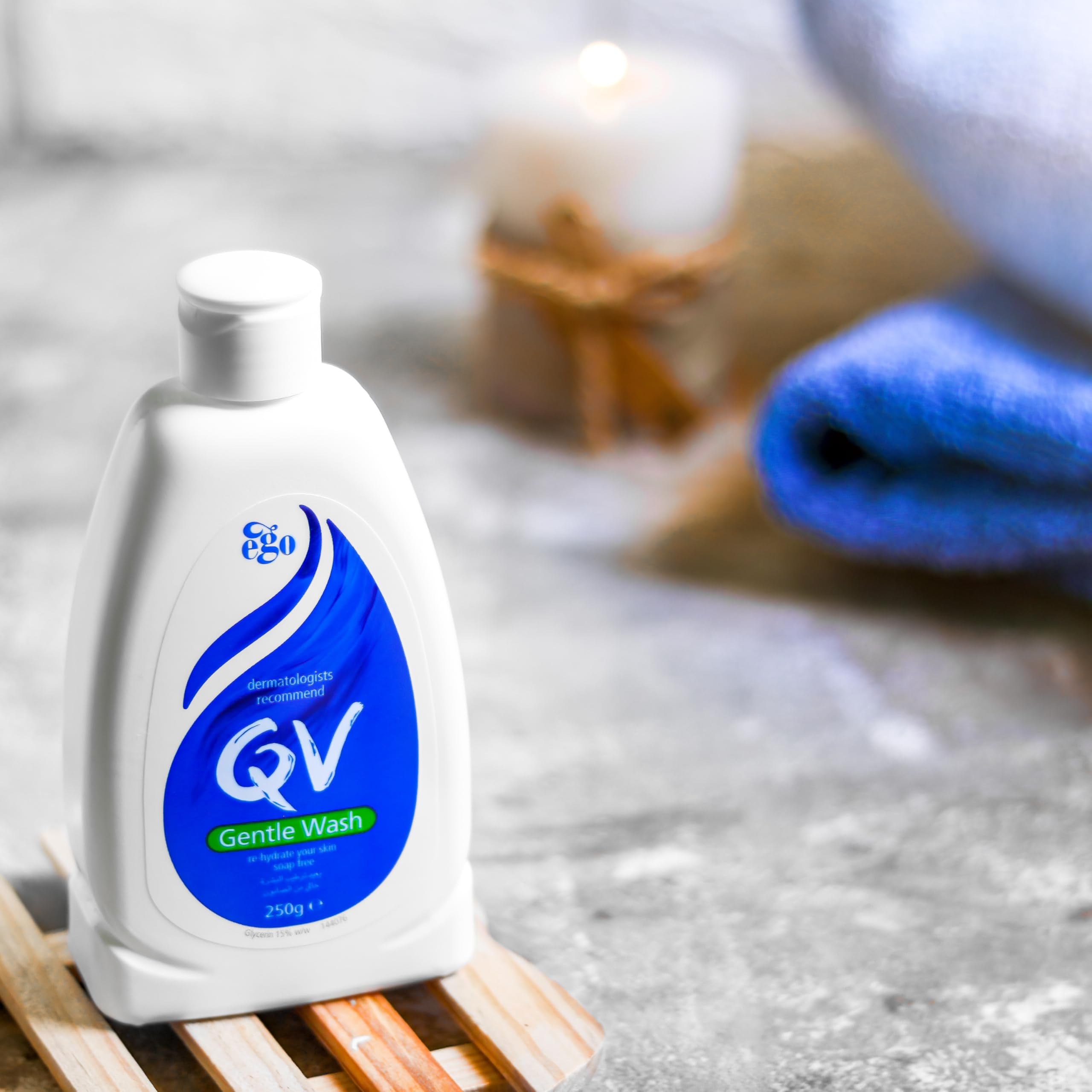 Person applying QV Gentle Wash in shower
