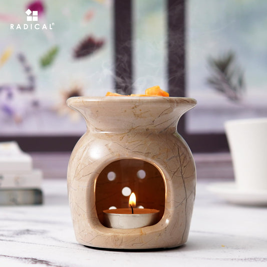 Radicaln Marble Oil Burner side view highlights compact 4-inch height for small spaces.