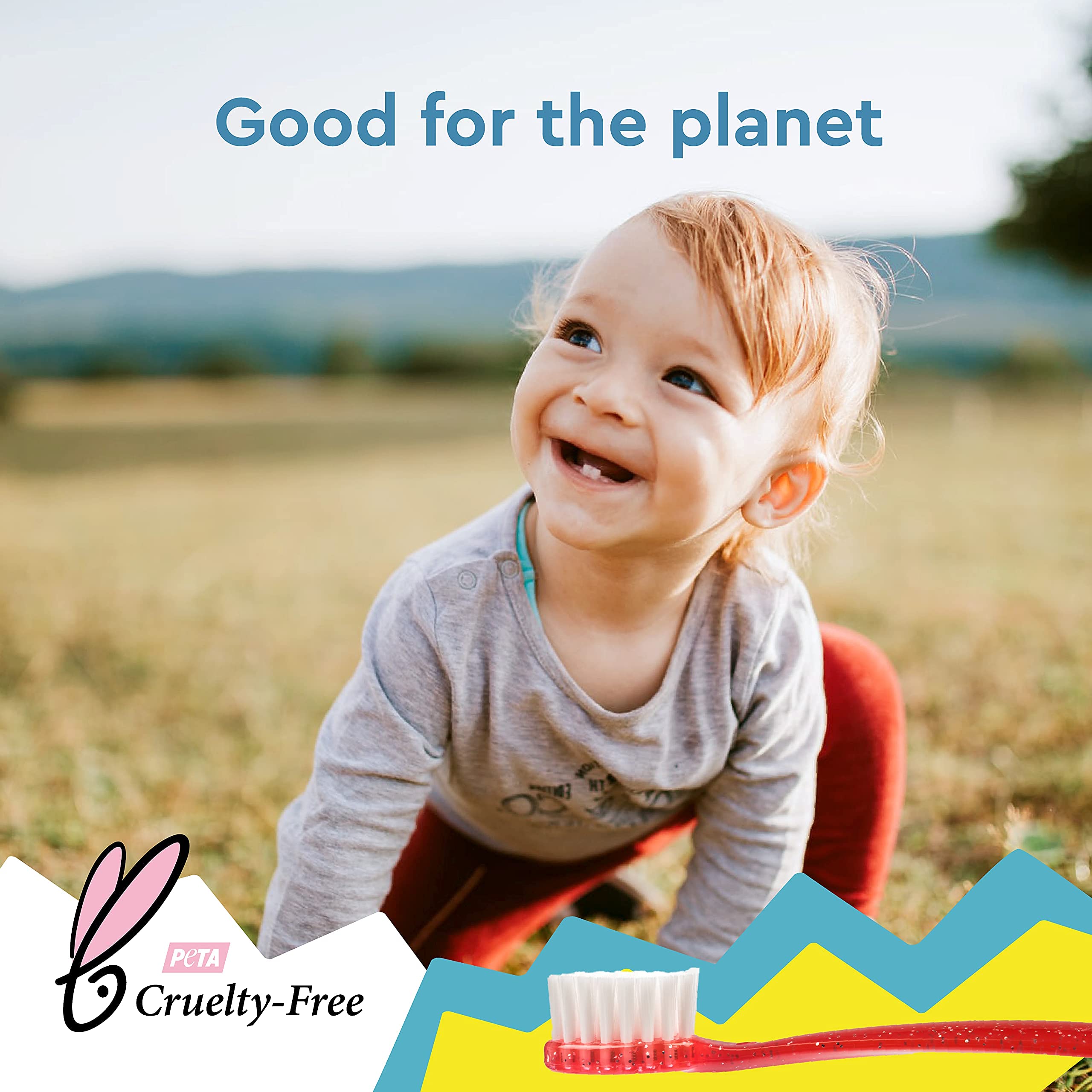 Toddler hands gripping Totz toothbrush