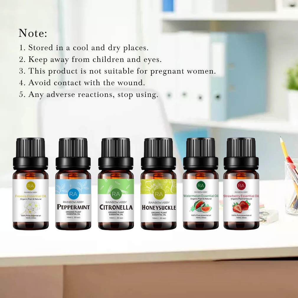 Rainbow Abby freesia essential oil bottle delivering floral notes for calming environments.