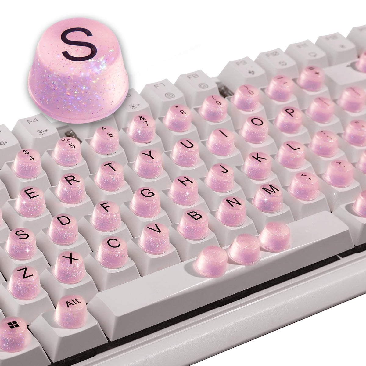 Raised Button pink bling keycaps for 64 keys improve grip during typing.