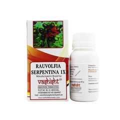 Close-up of Rauwolfia Serpentina 1X tablets in bottle.