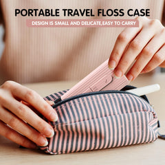Small travel floss case tucked in a pocket or bag