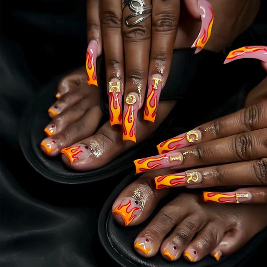 Rdntbeu Fire Press-On Nails with Orange French Tip for a quick salon-style manicure.