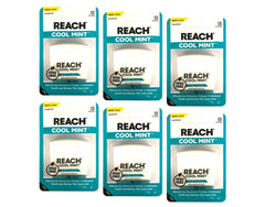 Close-up of REACH dental floss spool in mint flavor