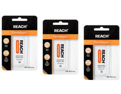 Reach Dentotape waxed dental floss packaging 3-pack