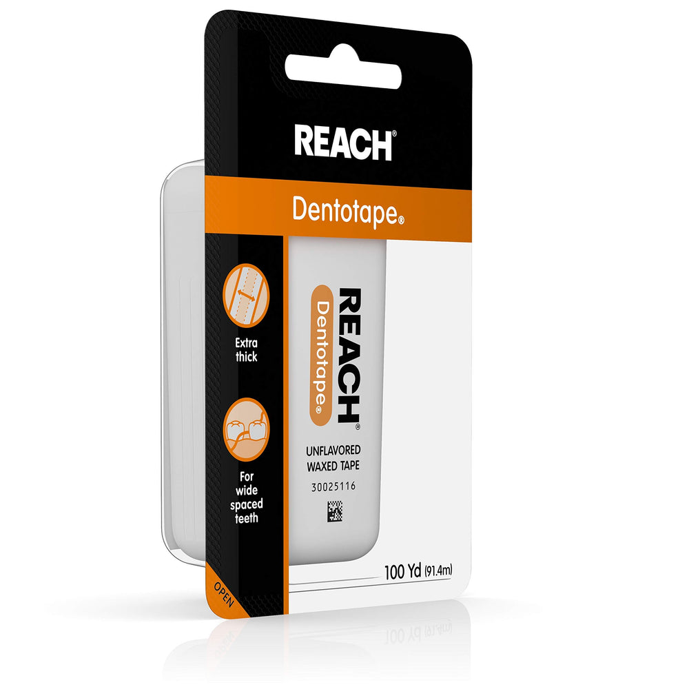 Close-up of Reach Dentotape waxed dental tape showing smooth wax coating