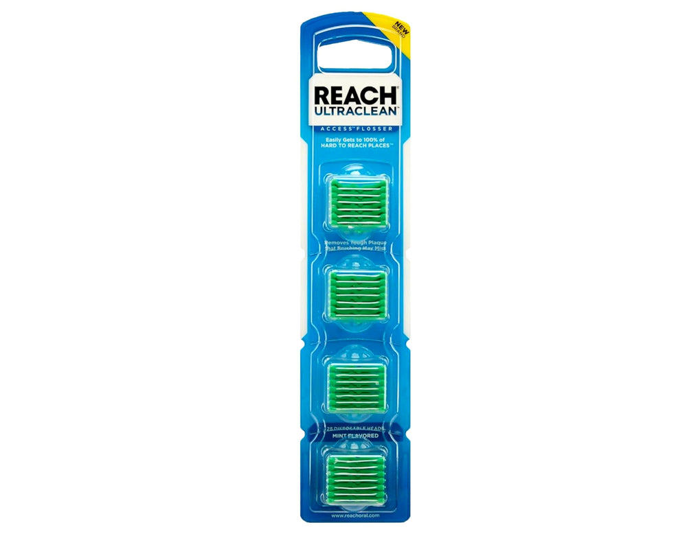 Person using REACH flosser