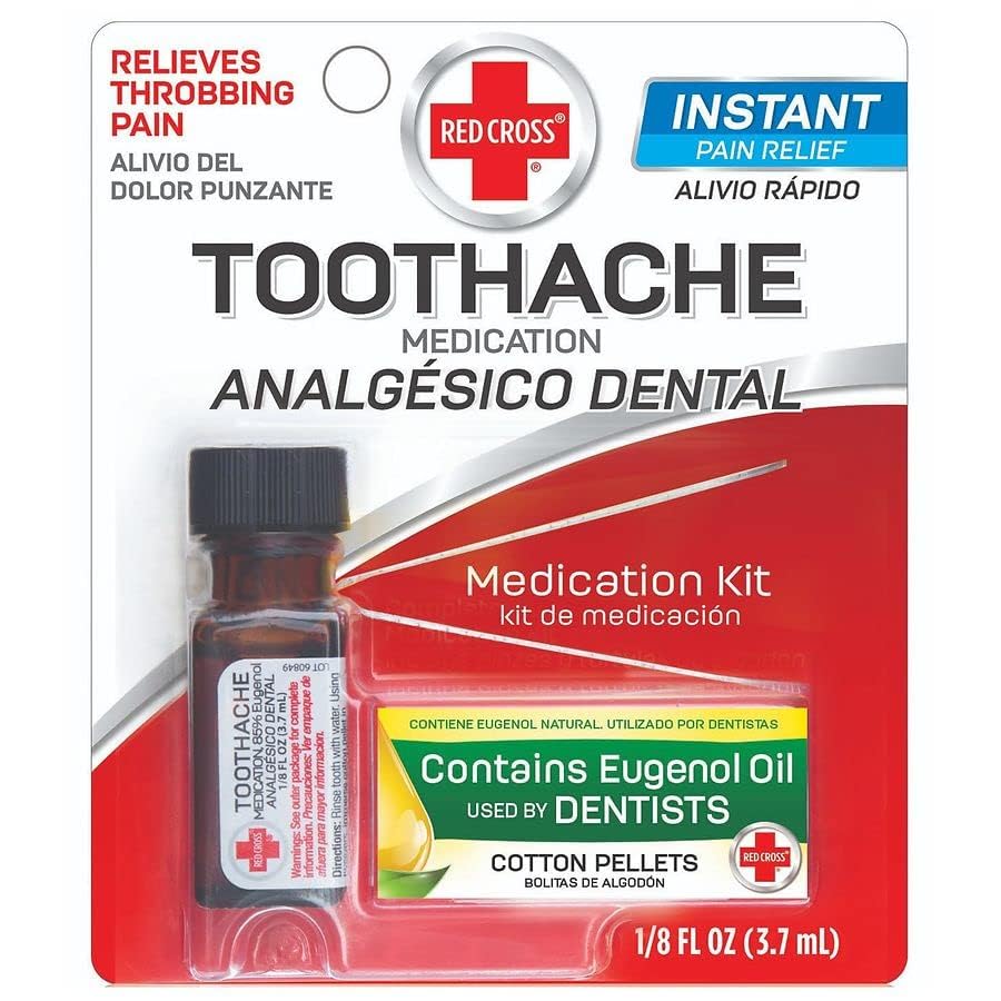 All components of the Red Cross Toothache Drops kit laid out