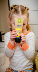Close-up of Earthpaste ingredients: Bentonite clay, sea salt, essential oils