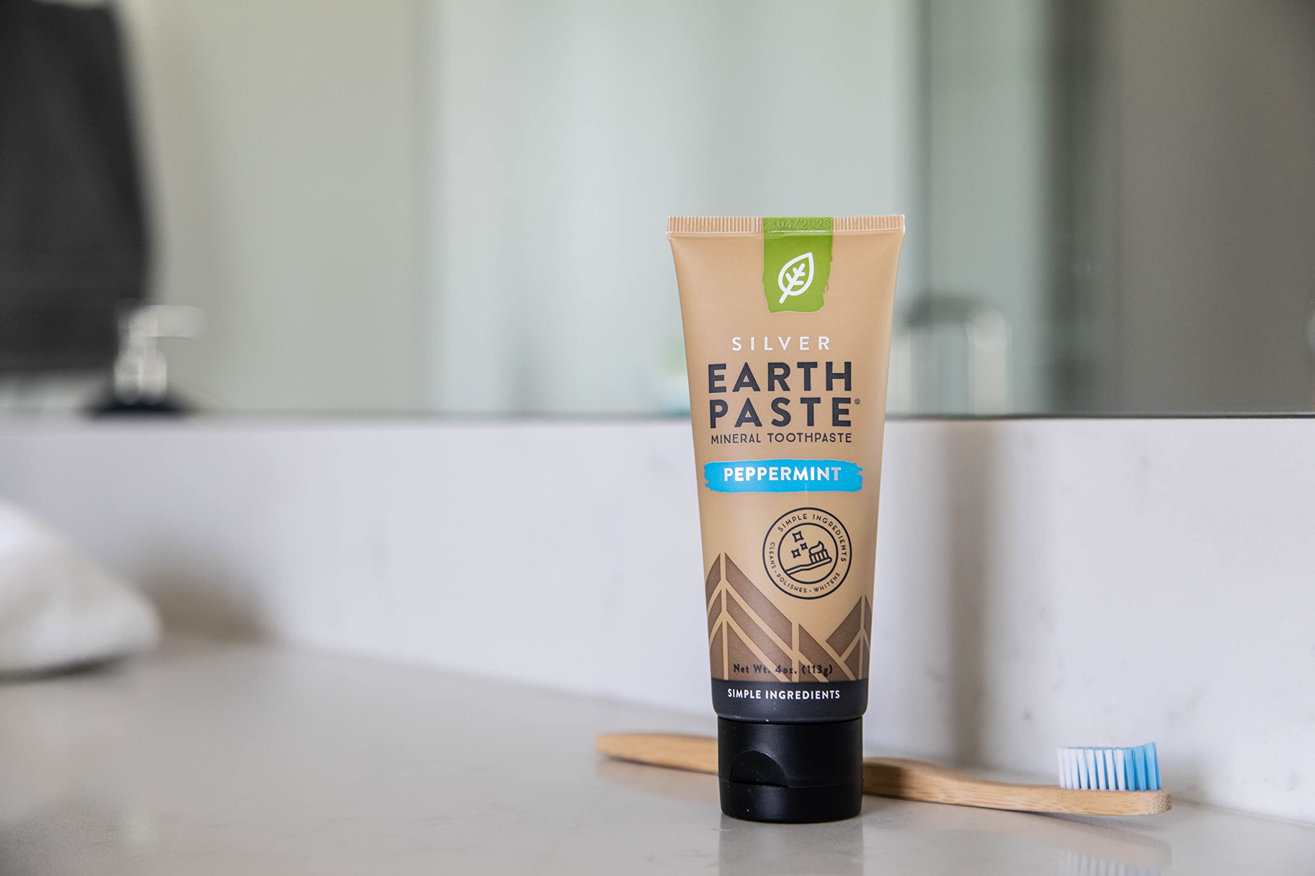 Vegan and gluten-free icons on Earthpaste packaging