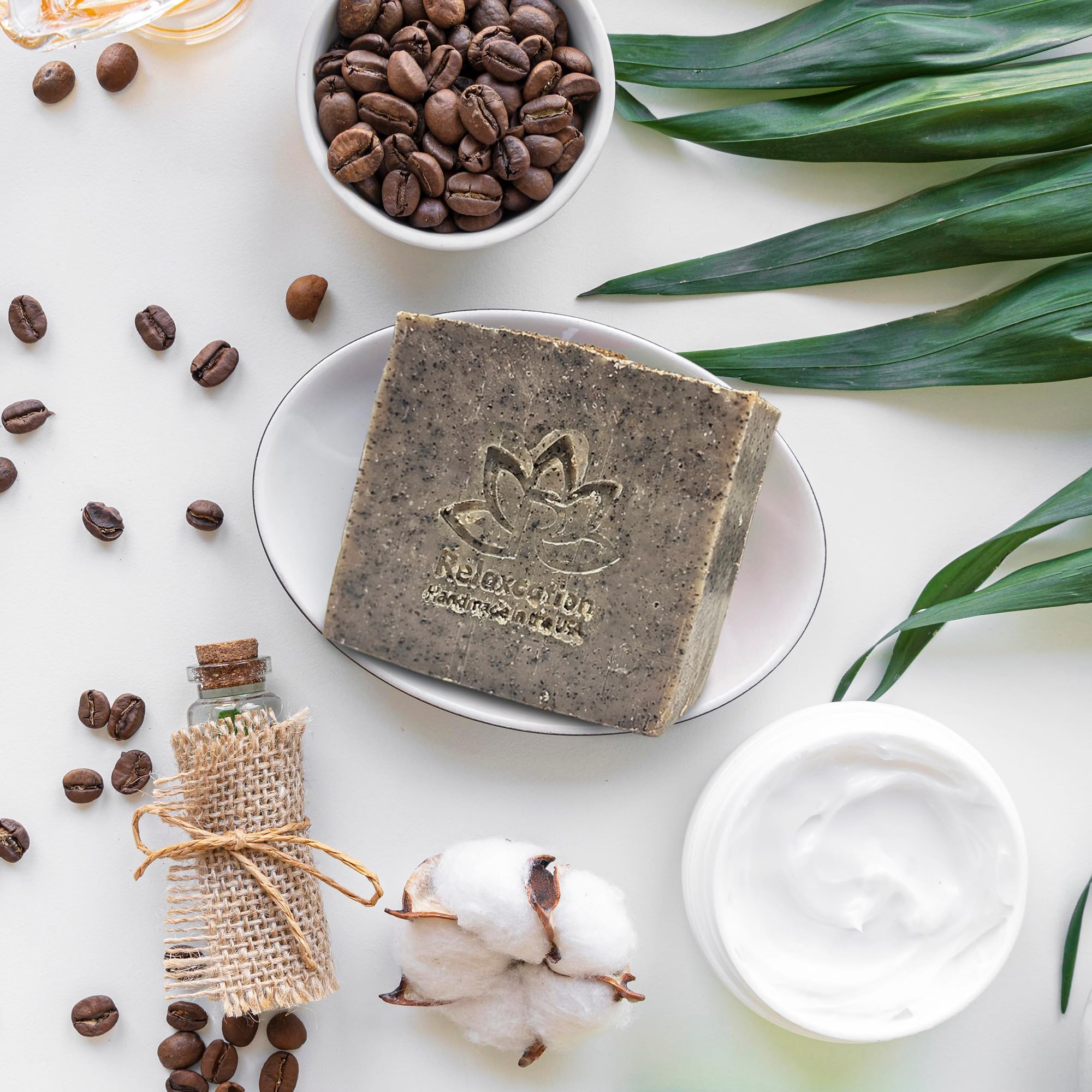 Relaxcation coffee scrub soap bar latte aroma oil delivers cafe-like scent.