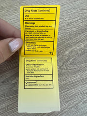 Label highlighting vegan formula and absence of artificial additives