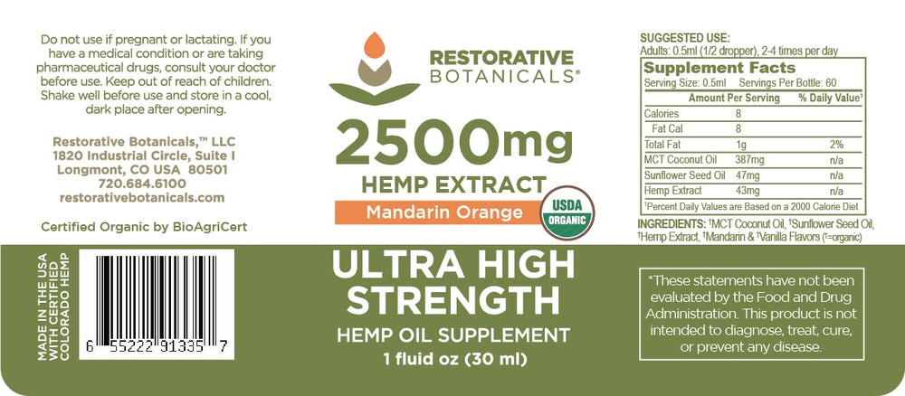 Hemp oil bottle close-up showing 2500mg and Mandarin Orange flavor