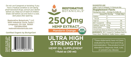 Hemp oil bottle close-up showing 2500mg and Mandarin Orange flavor