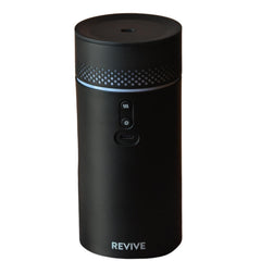 Revive Essential Oils Forte Rechargeable Diffuser in car cup holder provides drive-time aroma.