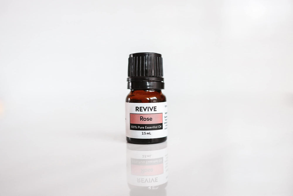REVIVEEO Rose oil massage application for relaxing tension relief.