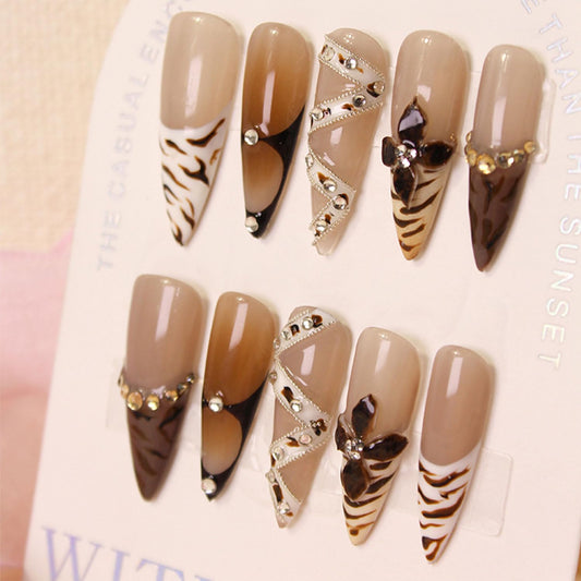 RIICFDD luxury French press-on nails in long almond shape with brown flower art for elegance.