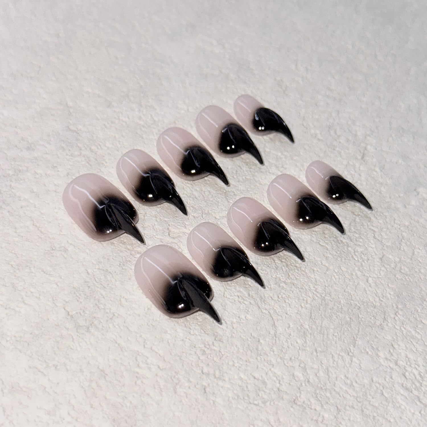 RIICFDD stiletto press-on nails with glossy finish for a quick salon-style manicure.