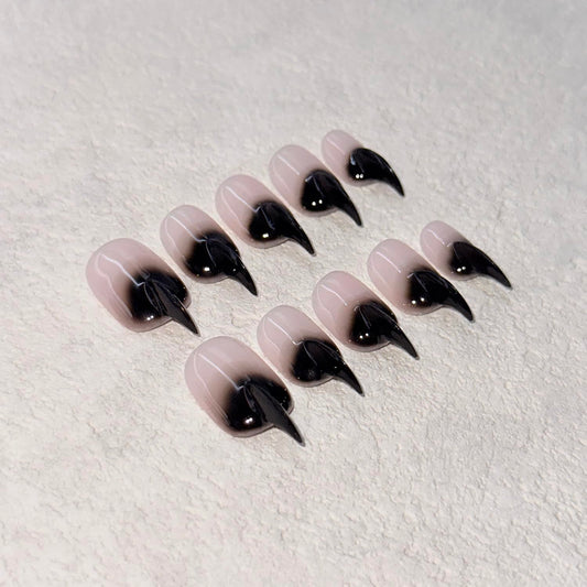 RIICFDD stiletto press-on nails with glossy finish for a quick salon-style manicure.