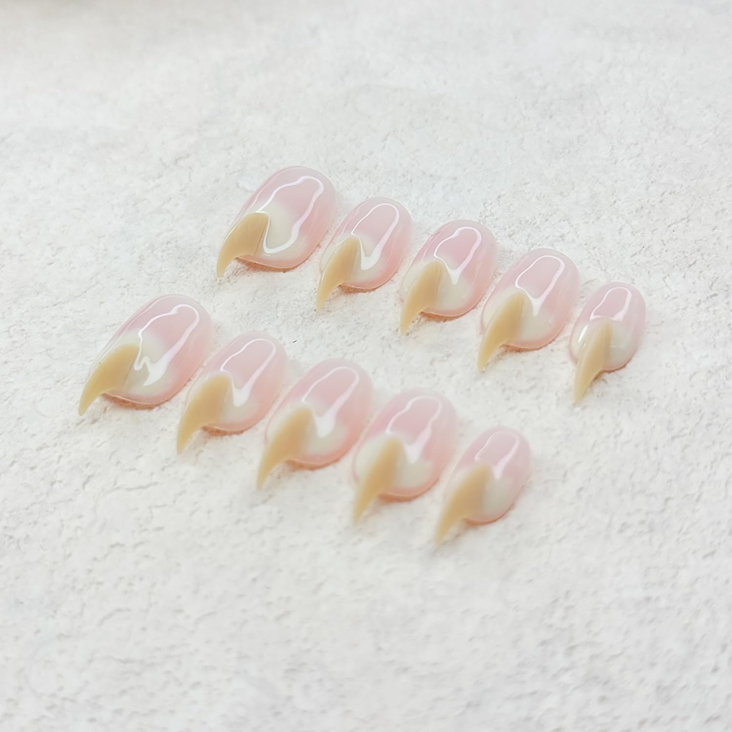 RIICFDD wedding-ready beige cat-claw nails for special events.