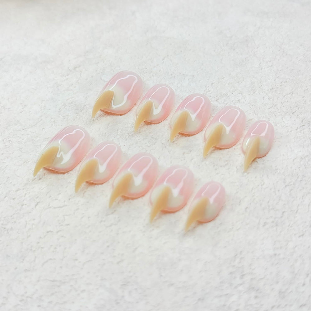 RIICFDD wedding-ready beige cat-claw nails for special events.