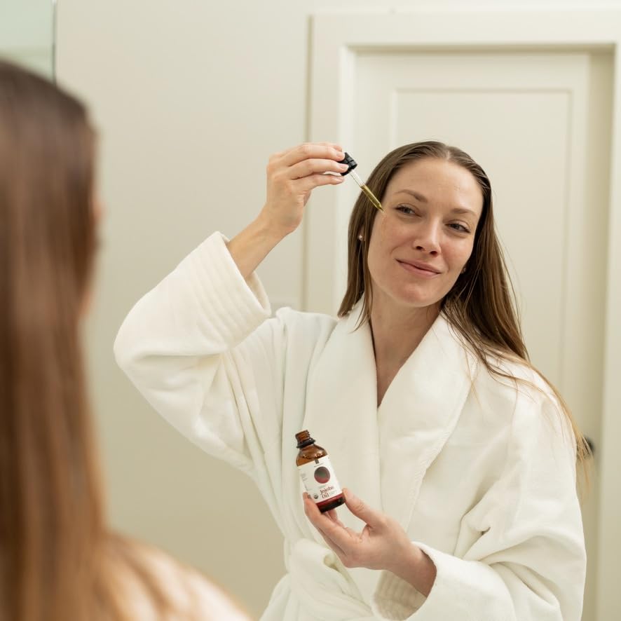 River Cosmetics Jojoba Oil in dark glass bottle preserves purity and quality.