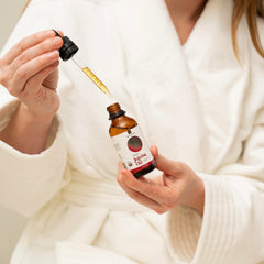 River Cosmetics Jojoba Oil on hair nourishes scalp and adds natural shine.